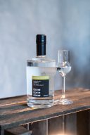 Flasche des Obstbrandes Schweizer Wasserbirne von hinten